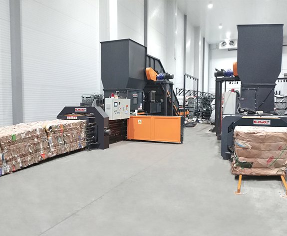 Automatizované riešenie likvidácie odpadových obalov v poprednom ruskom logistickom centre supermarketov